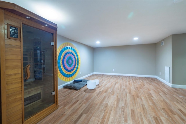 135 Flamingo St, Atlantic Beach, NY 11509 - empty room featuring light wood finished floors, recessed lighting, and a sauna