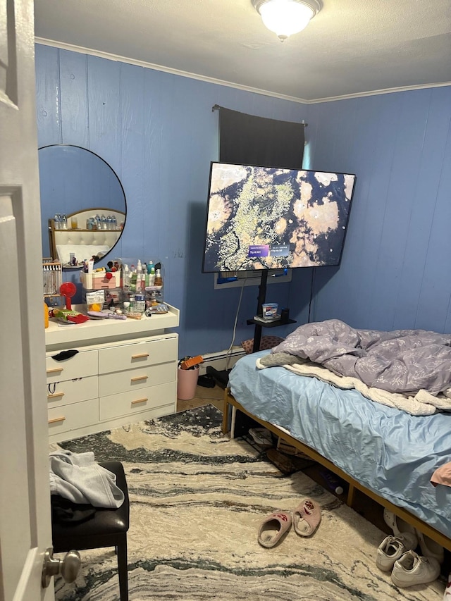 40 Samuel St, Ronkonkoma, NY 11779 - bedroom featuring ornamental molding and a baseboard heating unit