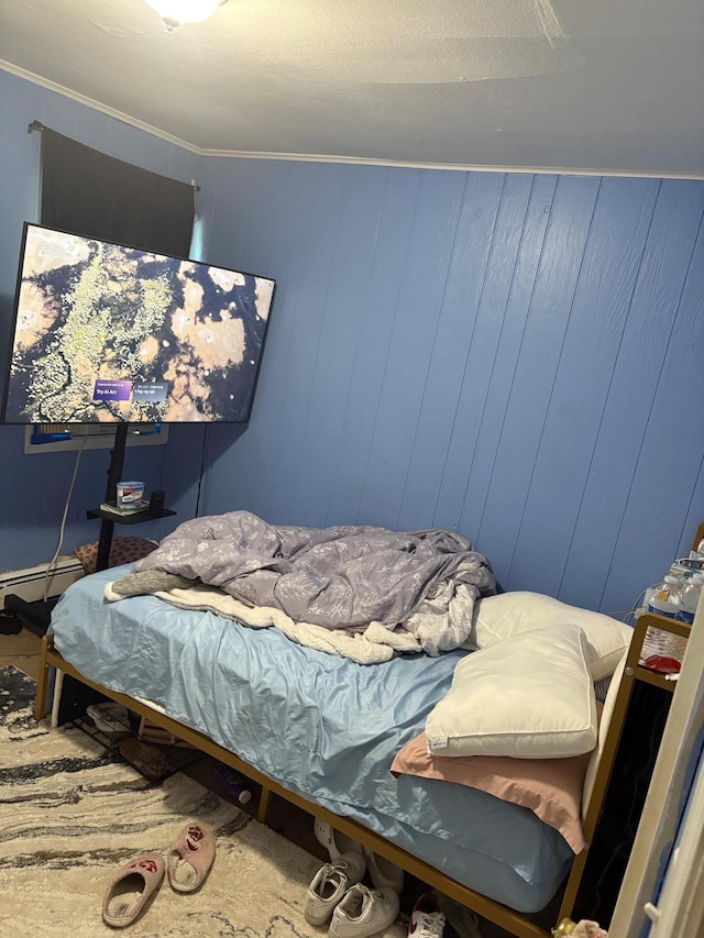 40 Samuel St, Ronkonkoma, NY 11779 - bedroom featuring crown molding and a baseboard radiator