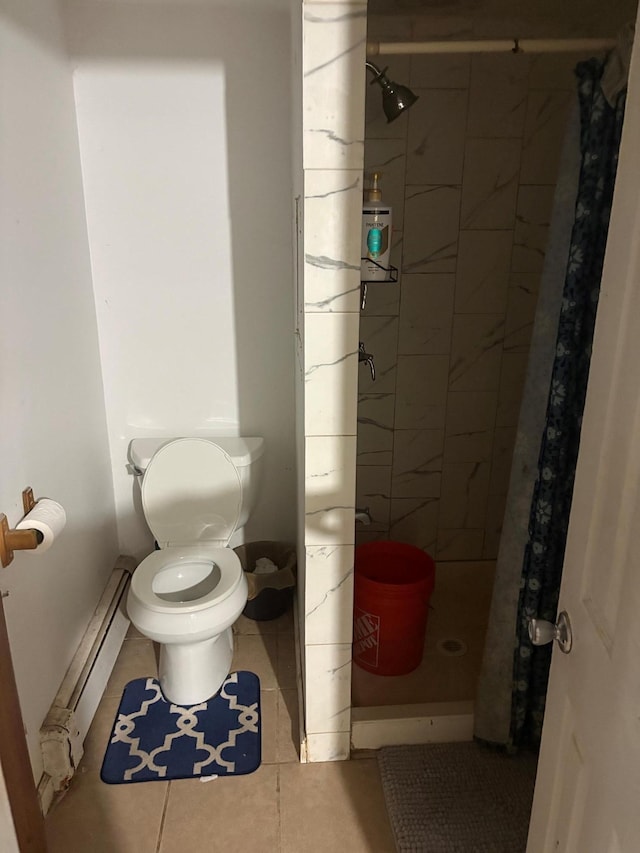 40 Samuel St, Ronkonkoma, NY 11779 - bathroom with a baseboard heating unit, a stall shower, and tile patterned floors