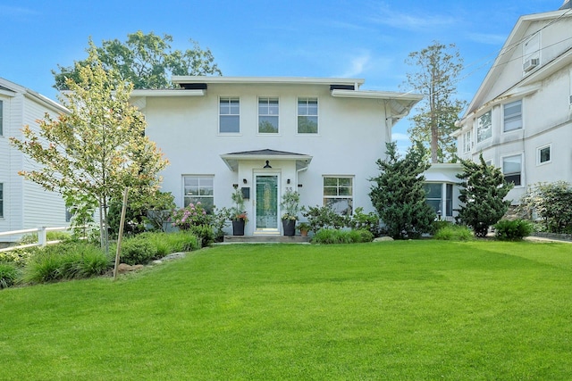 33 Belleview Ave, Ossining, NY 10562 - view of front of home featuring a front yard and stucco siding