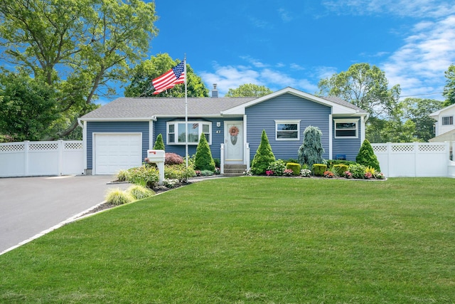 47 Tucker Dr, Bayport, NY 11705 - ranch-style home with an attached garage and asphalt driveway