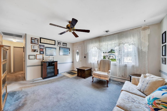 47 Tucker Dr, Bayport, NY 11705 - carpeted living area with a baseboard radiator and a ceiling fan