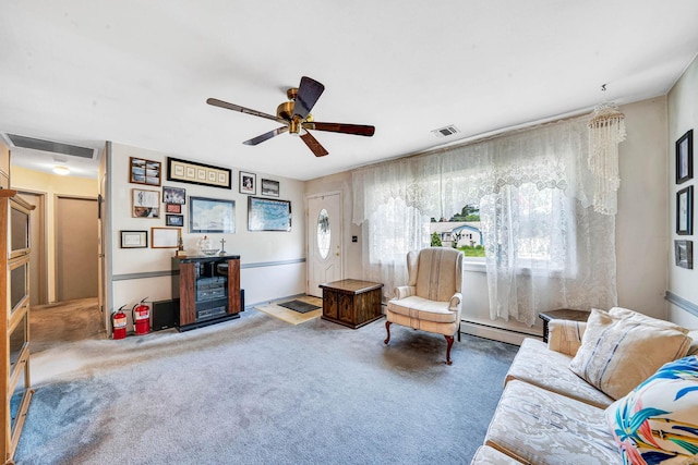 47 Tucker Dr, Bayport, NY 11705 - carpeted living area with baseboard heating and a ceiling fan