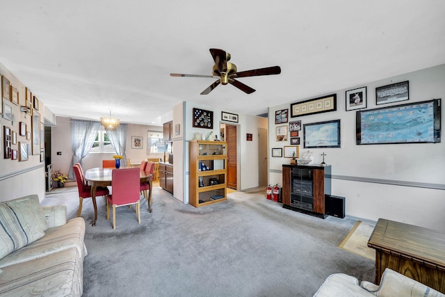 47 Tucker Dr, Bayport, NY 11705 - living area with carpet flooring and a ceiling fan