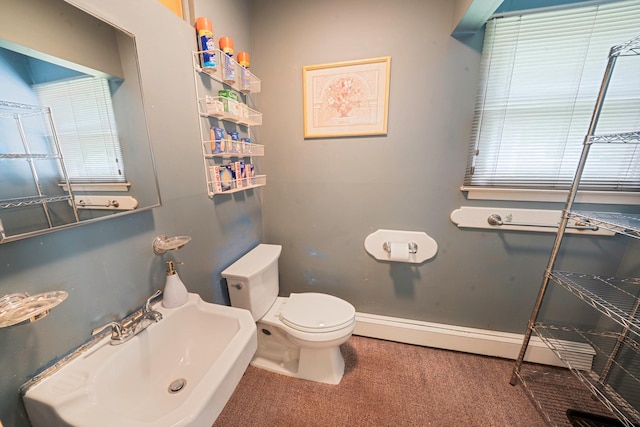 47 Tucker Dr, Bayport, NY 11705 - bathroom with toilet and a baseboard radiator