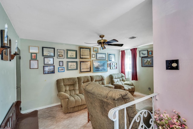 47 Tucker Dr, Bayport, NY 11705 - living area with carpet flooring and ceiling fan