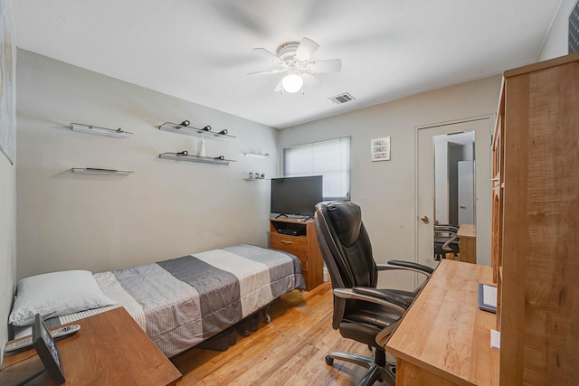 47 Tucker Dr, Bayport, NY 11705 - bedroom with wood finished floors, an office area, and a ceiling fan