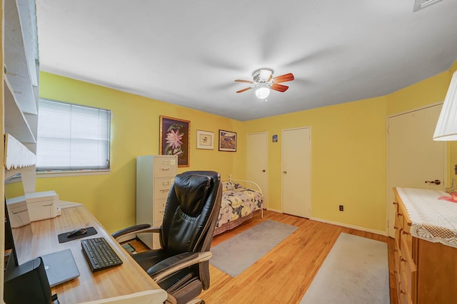 47 Tucker Dr, Bayport, NY 11705 - home office with ceiling fan and light wood-style floors
