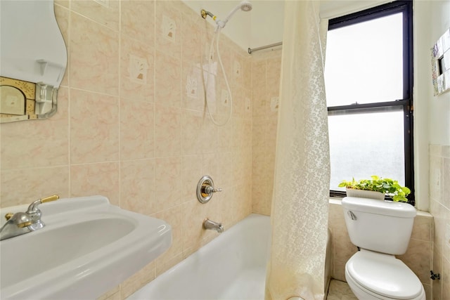 83-10 35th Ave Unit 5B, Jackson Heights, NY 11372 - bathroom with tile walls and shower / bath combination with curtain