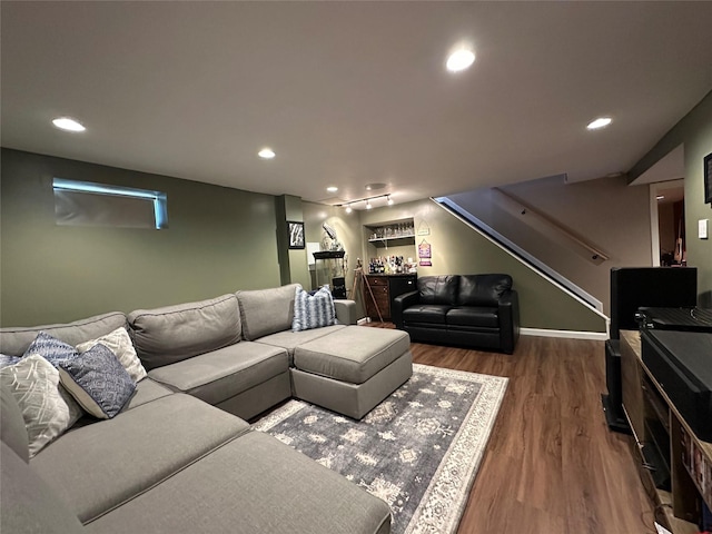 226 James St, Franklin Square, NY 11010 - living area with wood finished floors, recessed lighting, stairs, and bar area