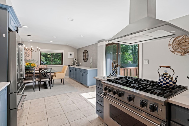 11 Val Ct, Commack, NY 11725 - kitchen with wall chimney exhaust hood, stainless steel appliances, light countertops, a chandelier, and recessed lighting