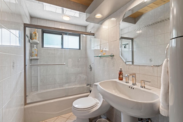 11 Val Ct, Commack, NY 11725 - bathroom with tile walls, combined bath / shower with glass door, and tile patterned floors