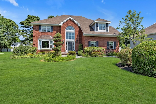 17 Pheasant Run Ln, Dix Hills, NY 11746 - view of front of property with a front lawn, brick siding, and roof with shingles
