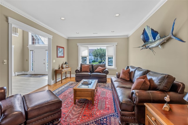 17 Pheasant Run Ln, Dix Hills, NY 11746 - living area featuring baseboard heating, healthy amount of natural light, light wood finished floors, recessed lighting, and crown molding