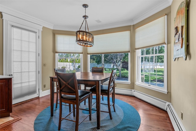 17 Pheasant Run Ln, Dix Hills, NY 11746 - dining space with a chandelier, healthy amount of natural light, crown molding, wood finished floors, and a baseboard radiator