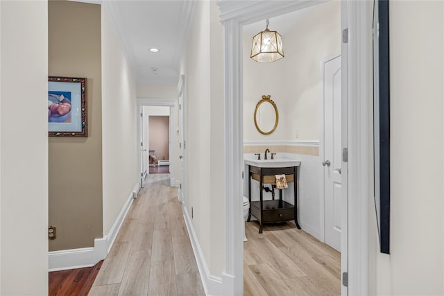 17 Pheasant Run Ln, Dix Hills, NY 11746 - corridor featuring light wood-type flooring and ornamental molding