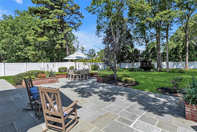 17 Pheasant Run Ln, Dix Hills, NY 11746 - fenced backyard with a patio and outdoor dining space
