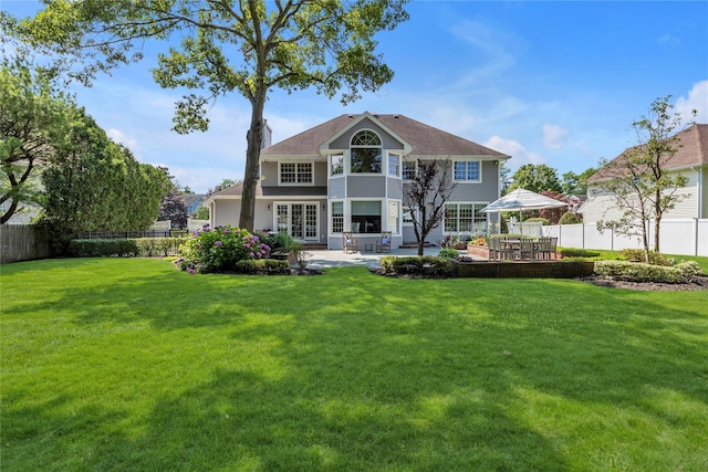 17 Pheasant Run Ln, Dix Hills, NY 11746 - rear view of property featuring a fenced backyard, a patio, and french doors