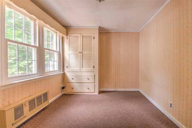 62 Port Washington Rd, Sound Beach, NY 11789 - empty room with carpet floors, crown molding, and wallpapered walls
