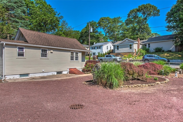 62 Port Washington Rd, Sound Beach, NY 11789 - rear view of house featuring a shingled roof