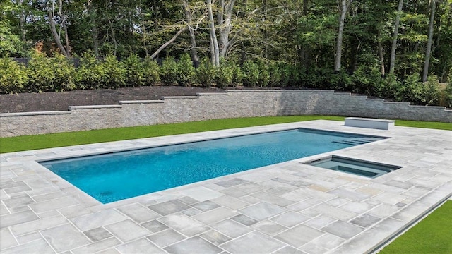 128 Sandy Hollow Rd, Southampton, NY 11968 - outdoor pool featuring a patio area and an in-ground hot tub