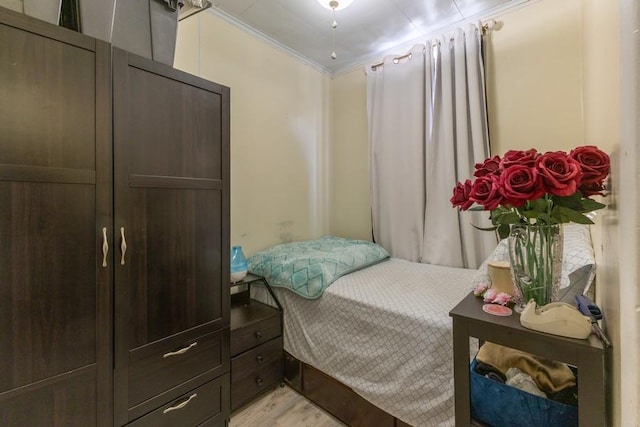 5836 Catalpa Ave, Ridgewood, NY 11385 - bedroom with ornamental molding and light wood-style flooring