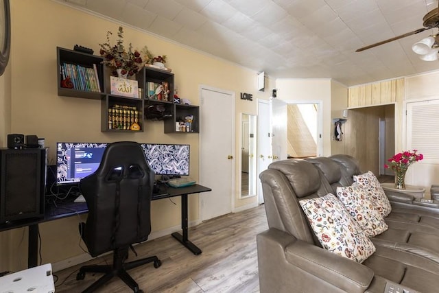 5836 Catalpa Ave, Ridgewood, NY 11385 - office area featuring wood finished floors, ceiling fan, and ornamental molding