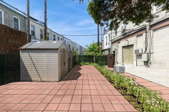 5836 Catalpa Ave, Ridgewood, NY 11385 - view of patio / terrace featuring a storage shed