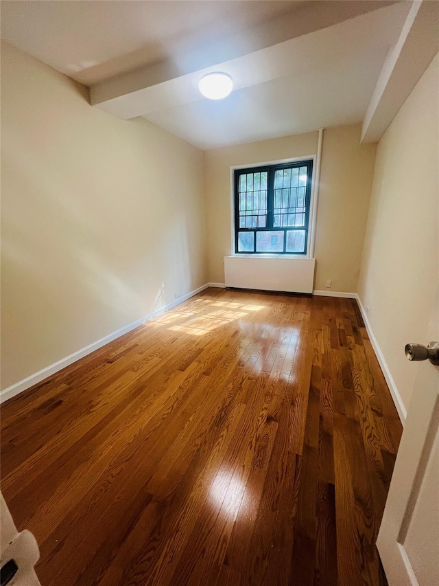 1722 Purdy St Unit 1H, Bronx, NY 10462 - unfurnished room with wood finished floors and baseboards