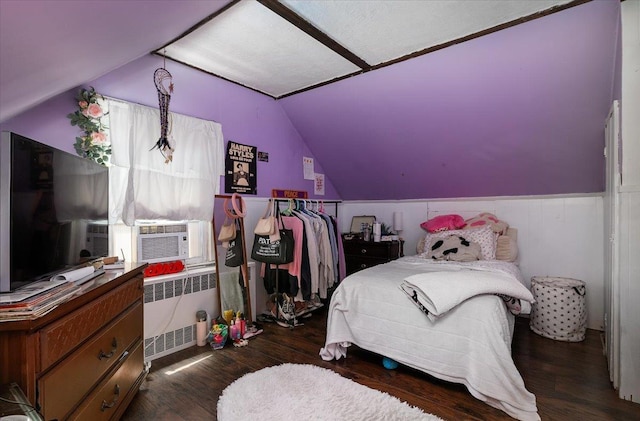 209 Venetian Blvd, Lindenhurst, NY 11757 - bedroom featuring radiator heating unit, lofted ceiling, wood finished floors, and cooling unit