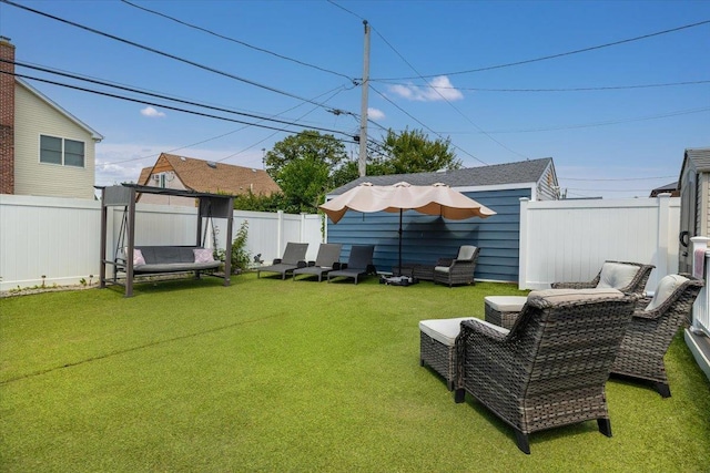 209 Venetian Blvd, Lindenhurst, NY 11757 - fenced backyard featuring an outdoor hangout area