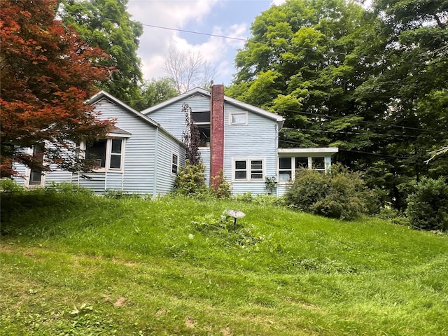 1391 County Route 7, Ancram, NY 12502 - rear view of property featuring a chimney