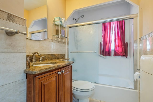 66 Gates Ave, Valley Stream, NY 11580 - full bath featuring vanity, combined bath / shower with glass door, and decorative backsplash