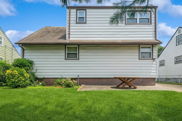 66 Gates Ave, Valley Stream, NY 11580 - rear view of property featuring a yard and a shingled roof