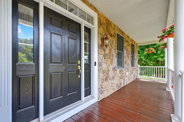 36 Ballymeade Rd, Hopewell Junction, NY 12533 - view of exterior entry with stone siding and a porch