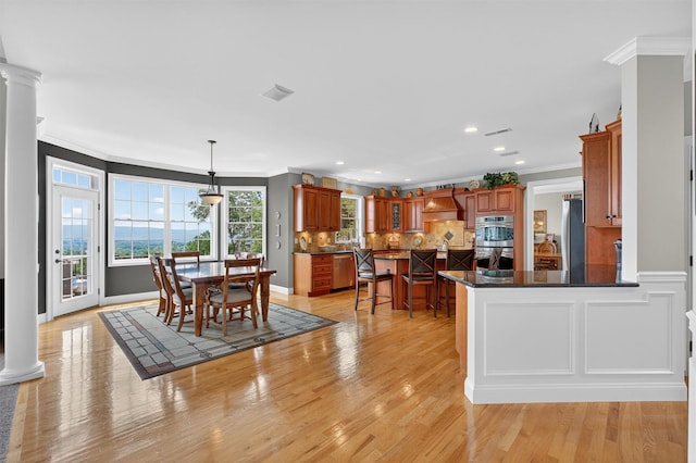 36 Ballymeade Rd, Hopewell Junction, NY 12533 - dining room featuring ornamental molding, light wood-type flooring, recessed lighting, and decorative columns