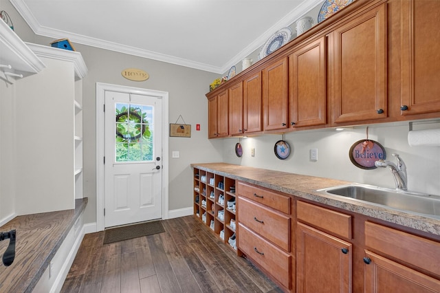 36 Ballymeade Rd, Hopewell Junction, NY 12533 - laundry room featuring dark wood-style flooring and ornamental molding