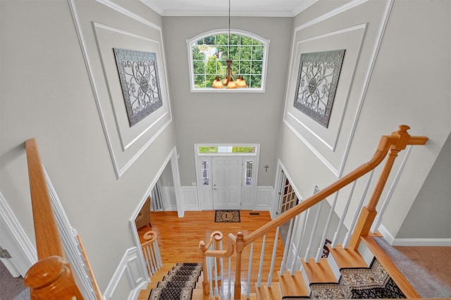 36 Ballymeade Rd, Hopewell Junction, NY 12533 - entryway with stairs, a towering ceiling, crown molding, and wood finished floors