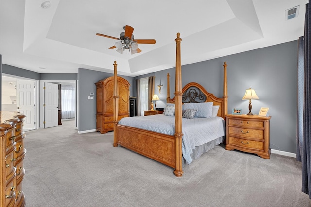 36 Ballymeade Rd, Hopewell Junction, NY 12533 - carpeted bedroom featuring a tray ceiling and ceiling fan