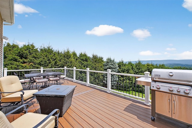 36 Ballymeade Rd, Hopewell Junction, NY 12533 - wooden deck with outdoor dining area and area for grilling