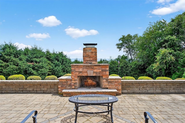 36 Ballymeade Rd, Hopewell Junction, NY 12533 - view of patio with an outdoor stone fireplace
