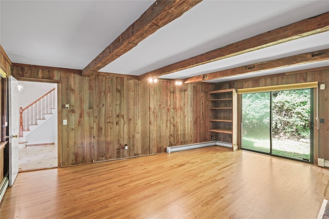 21 Kipp St, Chappaqua, NY 10514 - unfurnished room with baseboard heating, wooden walls, light wood finished floors, beam ceiling, and stairway