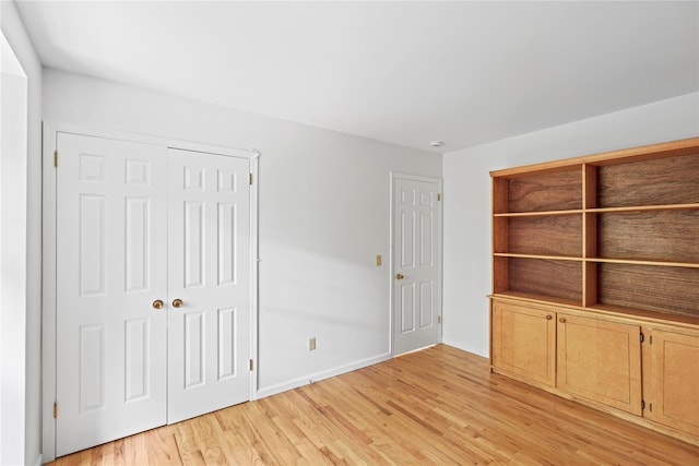 21 Kipp St, Chappaqua, NY 10514 - unfurnished bedroom featuring light wood-style flooring and a closet