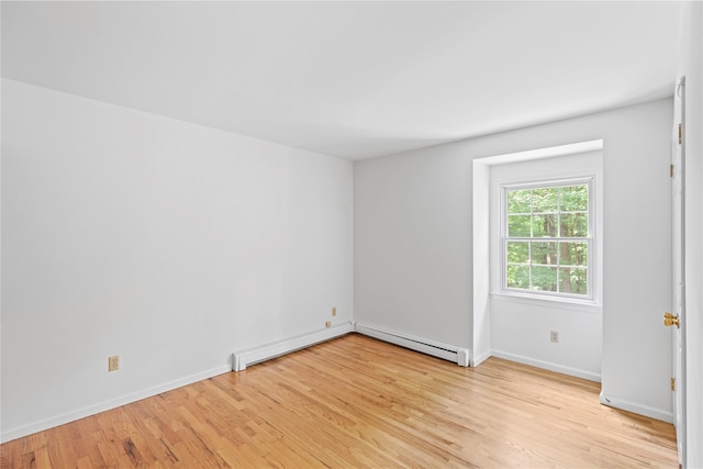 21 Kipp St, Chappaqua, NY 10514 - spare room featuring light wood-style flooring and baseboard heating