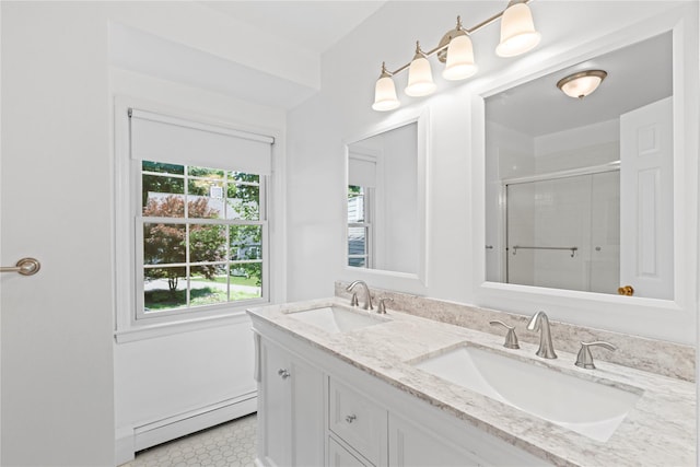 21 Kipp St, Chappaqua, NY 10514 - bathroom featuring a baseboard heating unit, a stall shower, and double vanity