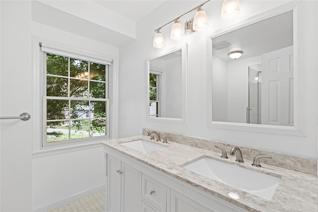 21 Kipp St, Chappaqua, NY 10514 - full bath with double vanity and baseboards