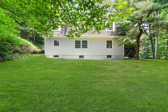21 Kipp St, Chappaqua, NY 10514 - rear view of house featuring a yard and a shingled roof