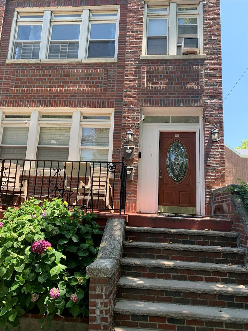 1626 Mayflower Ave, Bronx, NY 10461 - doorway to property featuring brick siding