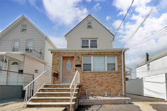 12311 115th Ave, South Ozone Park, NY 11420 - traditional home featuring brick siding and entry steps